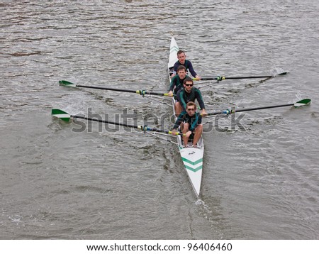 BRISTOL, ENGLAND - FEBRUARY 19: Four man crew from the City of Bristol rowing club racing in the annual Head of the River race in Bristol, England on February 19, 2012. One hundred teams entered
