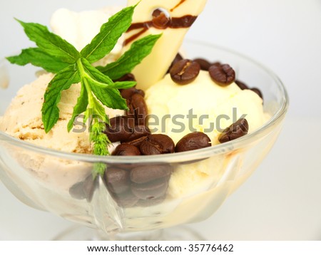Ice cream with coffee beans and leaves