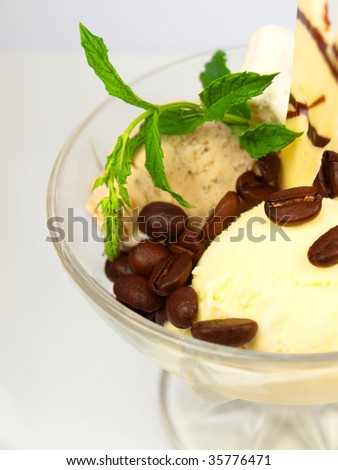 Ice cream with coffee beans and leaves