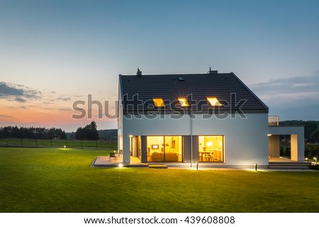 New style villa with outdoor lighting, night view