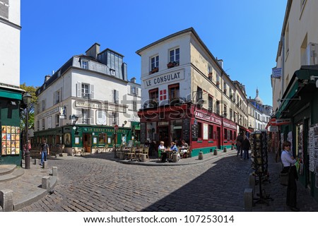 PARIS, FRANCE - MAY 19: The charming streets of Montmartre hill are full of art galleries, cafes and shops to walk about. It\'s one of the most visited landmarks in Paris. May 19, 2011 in Paris, France