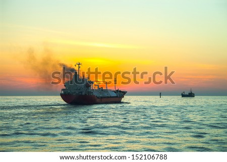 Seascape - LPG Tanker ship at sunrise.