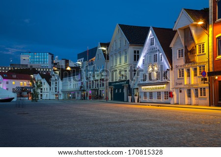 STAVANGER, NORWAY - JULY 14: White wooden houses in the old part city, on July 14, 2011 in Stavanger, Norway. Stavanger is Norway\'s fourth largest city, and is called the petroleum Capital of Norway.