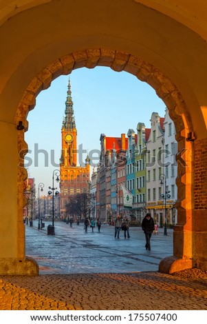 GDANSK, POLAND - MARCH 30: People visitors Long Street on March 30, 2010 in Gdansk, Poland. Street is one of the most notable tourist attractions of the city. Green Gate view for City Hall of Gdansk.