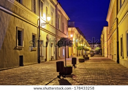 Historic house at night scene in Zamosc, Poland.