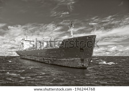 Photo of a tanker ship on sea in black and white tone.