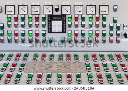 Many buttons and switches - control panel in a machine.