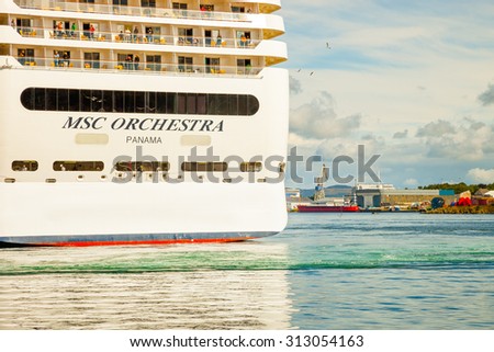 STAVANGER, NORWAY - JUNE 23: Luxury cruise ship MSC Orchestra with passengers on board, ship during mooring in the port of Stavanger, on June 23, 2015 in Stavanger, Norway.