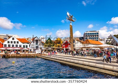 STAVANGER, NORWAY - JULY 15: Lot of tourists walking, shopping and sightseeing city center with many restaurants and pubs around, on July 15, 2015 in Stavanger, Norway.