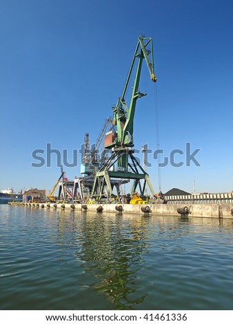 Ship crane in port load coals