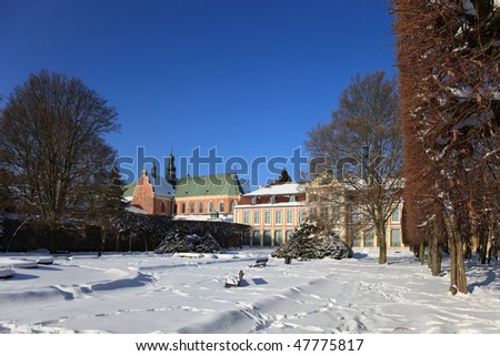 Winter Park in Oliwa Abbot\'s Palace and the Cathedral in the background, Poland.