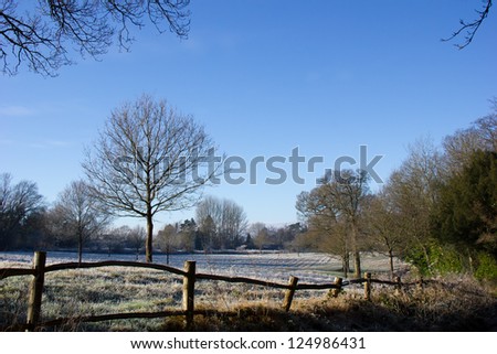 Countryside scene in winter with frost and sunshine