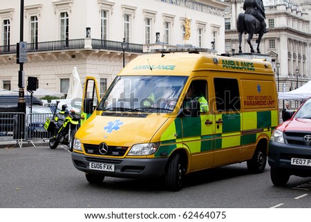 LONDON, ENGLAND - SEPTEMBER 15: Paramedics wait in parked Emergency Ambulance for call on 15 September 2010. Part of preparation for Pope\'s visit to London.