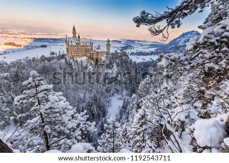 Neuschwanstein Castle during sunrise in winter landscape. Germany
