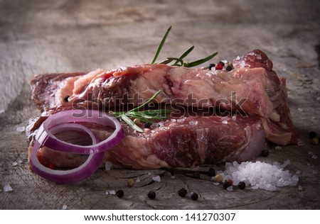 Premium Raw beef sirloin on wooden table