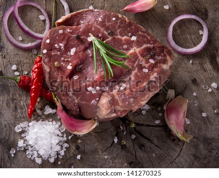 Premium Raw beef sirloin on wooden table