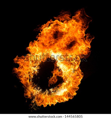 Fire flames face on a black background