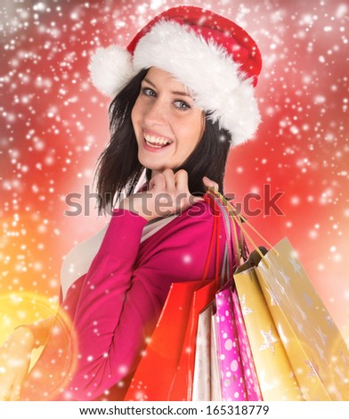 Christmas Shopping. Happy Woman with Shopping Bags.