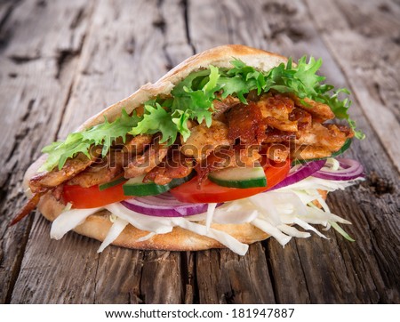 Doner Kebab - grilled meat, bread and vegetables