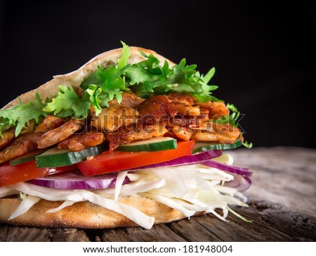 Doner Kebab - grilled meat, bread and vegetables
