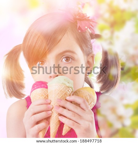 Little cute girl with ice cream, close-up.