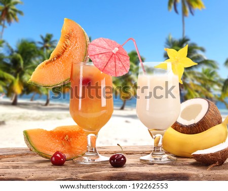 Summer drinks with beach on background
