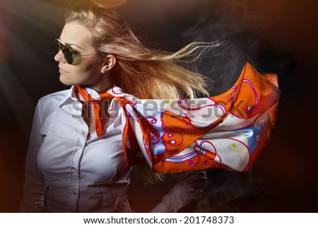 Fashion accessories, young pretty woman with flying scarf.