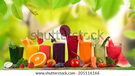 Fresh juice mix fruit, healthy drinks on wooden table.
