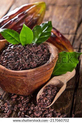 Cocoa pod with wooden bowl