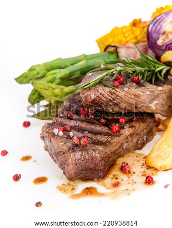 Delicious Beef steak on white background, close-up.