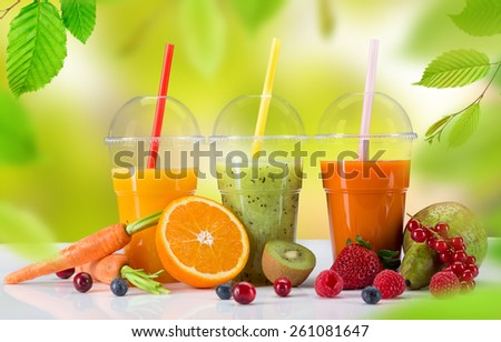 Fresh juice mix vegetables and fruit, healthy drinks on white table.