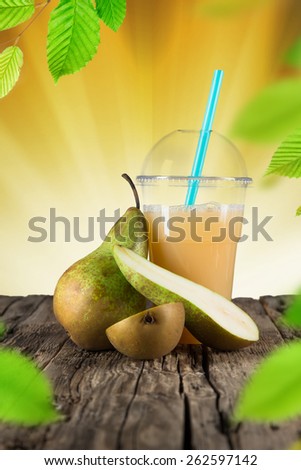 Fresh healthy pear juice, healthy drink on wooden table.