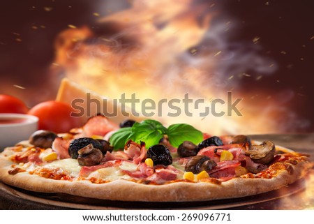 Delicious italian pizza served on wooden table, close-up.