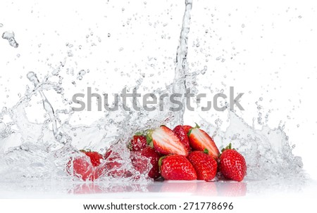 Fresh strawberries with water splash isolated on white