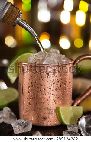 Cold Moscow Mule - Ginger Beer, lime and Vodka on bar