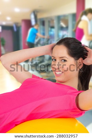 Woman training in a fitness club, close-up.