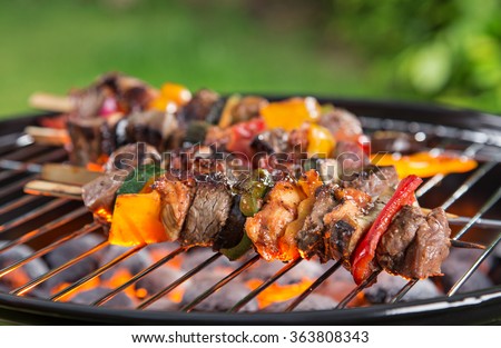 Barbecue grill with various kinds of meat, close-up.
