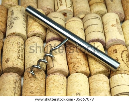Collection of vine corks and vine screw