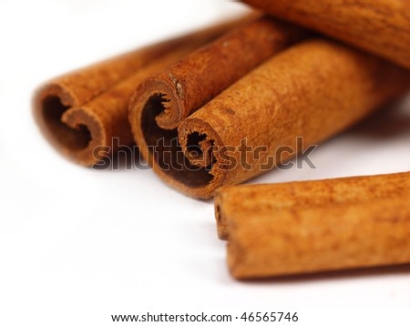 Cinnamon sticks isolated on white background. Close up