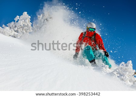 Freeride in fresh powder snow. Skiing.