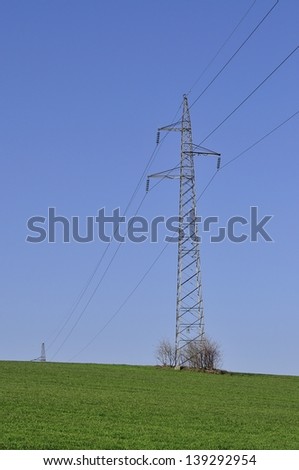 Power line across the wheat field