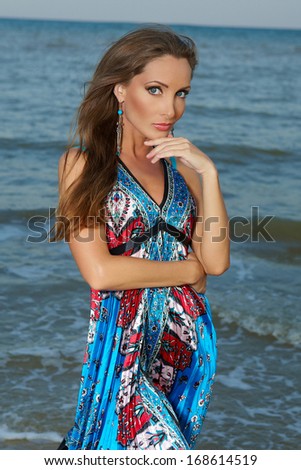 portrait beautiful lady of the sea in a  blue dress