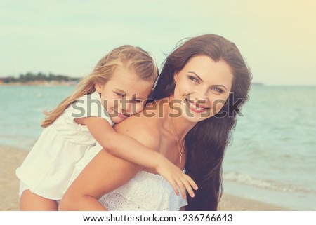Happy family. Young happy beautiful  mother and her little daughter hugging. Positive human emotions, feelings, emotions.