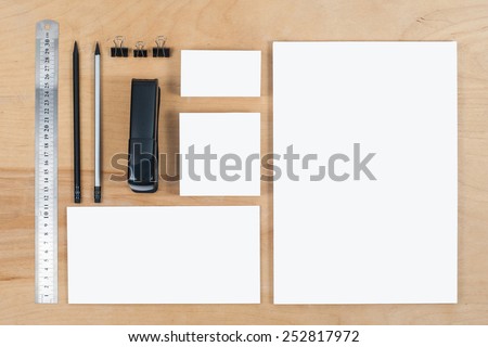 Photo. Template for branding identity. For graphic designers presentations and portfolios. On  wooden background.