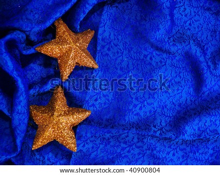 Christmas ornament - Gold star on silk blue background