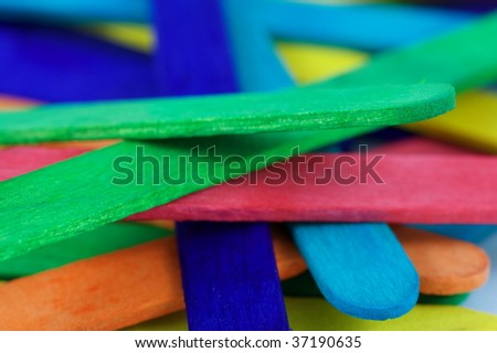 Close up on scattered colored lollipop sticks