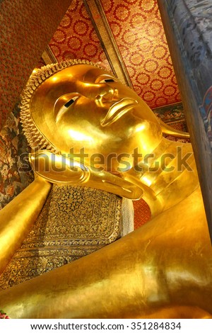 Reclining Buddha (Sleep Buddha) Wat Pho Temple in Bangkok Thailand.\
The image of the reclining Buddha represents the entry of Buddha into Nirvana and the end of all reincarnations.