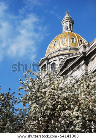Capitol building's gold dome in Denver Colorado's Capitol Hill neighborhood.