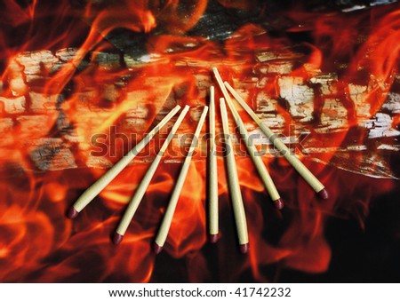Matches on flame background
