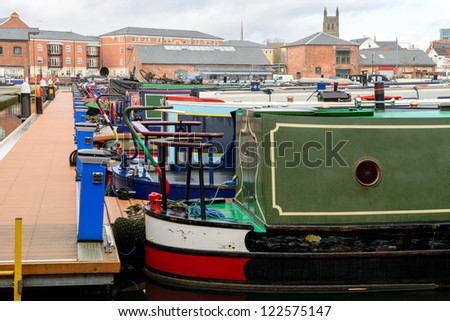 Colorful narrow boat sterns